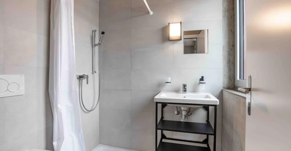 Appartement rooftop premium 2 chambres avec terrasse de 36 m² et vue sur les Alpes – Crissier, Lausanne