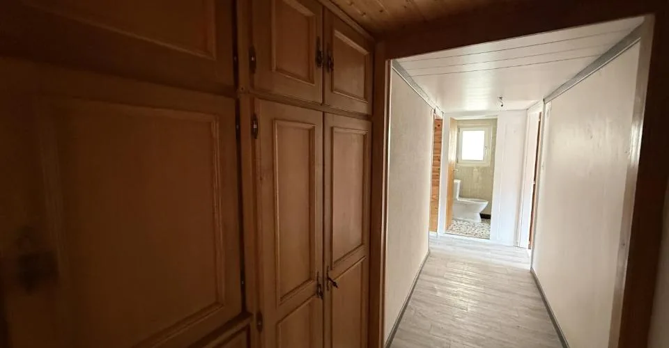 Immeuble avec 2 logements, grand jardin et combles aménagés à Vendlincourt