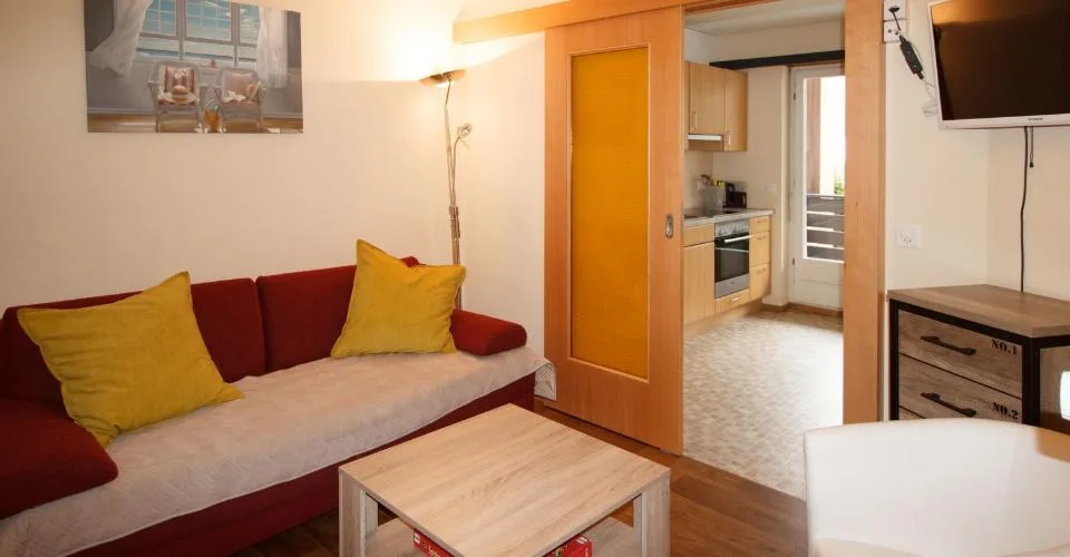 Appartement 3.0-10, appartement 3 pièces de standing avec 2 balcons exposés ouest, en plein centre-ville.
