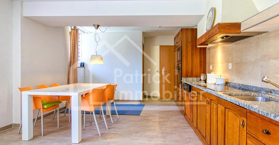 Immeuble d'habitation avec café restaurant Rendement brut 4,89 %
