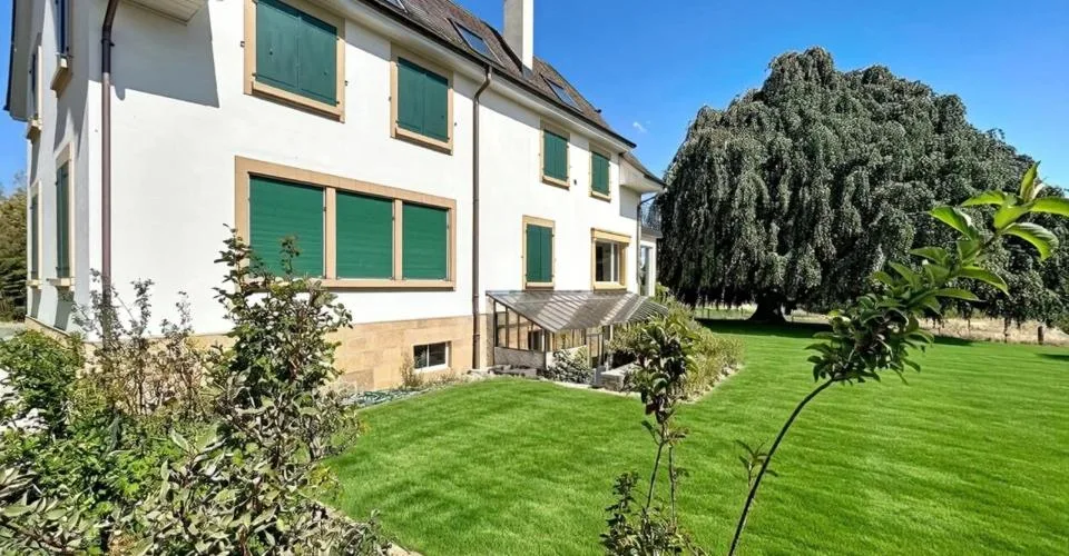 Maison de maître pieds dans l'eau