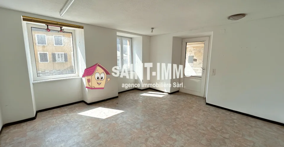 Immeuble locatif à réhabiliter de 4 appartements, un local, une parcelle constructible et un grand garage