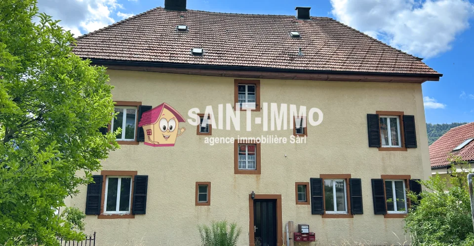 Immeuble locatif à réhabiliter de 4 appartements, un local, une parcelle constructible et un grand garage