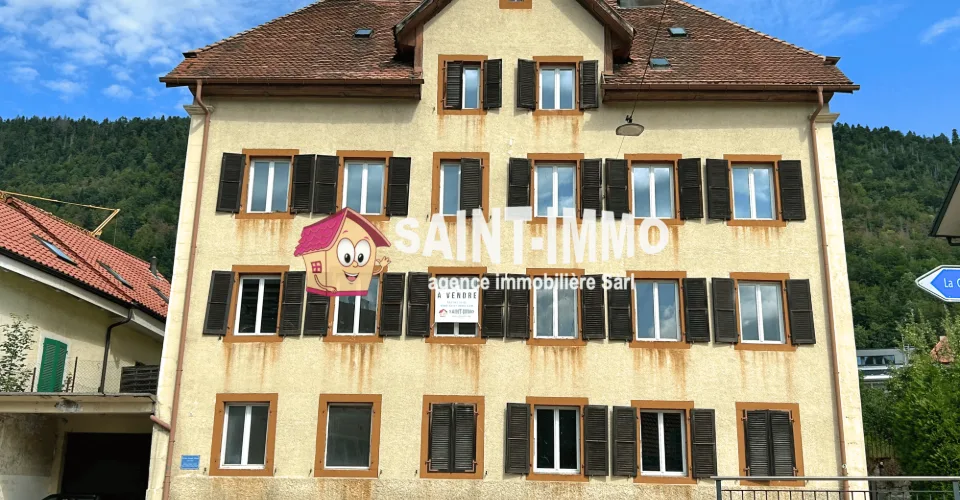 Immeuble locatif à réhabiliter de 4 appartements, un local, une parcelle constructible et un grand garage