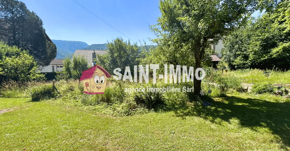 Charmant chalet avec dépendance, garage et jardin arboré sans vis-à-vis