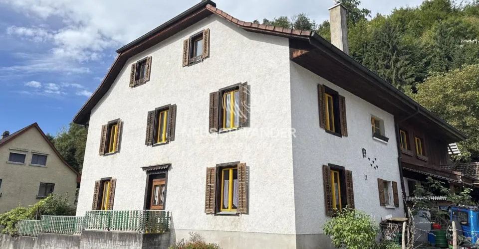 À vendre maison locative de 3 logements et 1 atelier à Soyhières