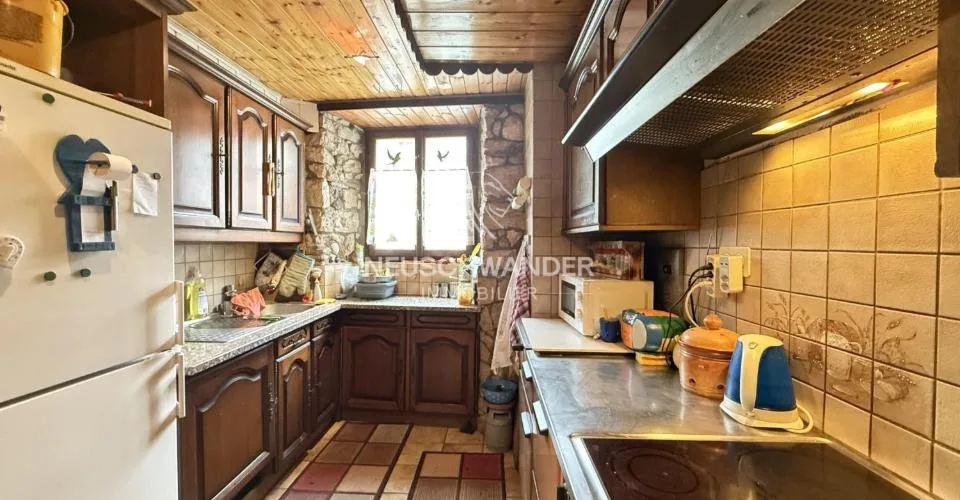 À vendre maison locative de 3 logements et 1 atelier à Soyhières