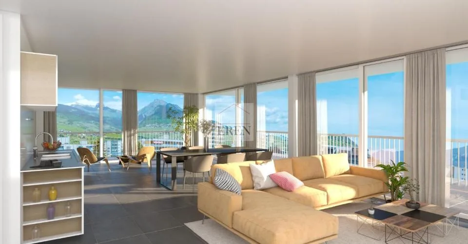 Magnifique et lumineux attique 3,5 - 4 pièces avec façade vitrées et balcon-terrasse panoramique sud-est