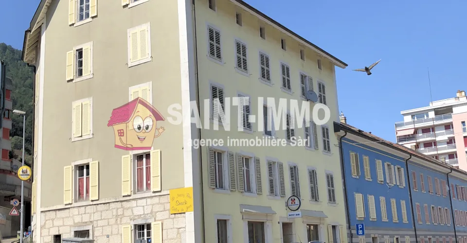 Immeuble locatif mixte de 6 appartements et bar/restaurant en plein centre de Saint-Imier