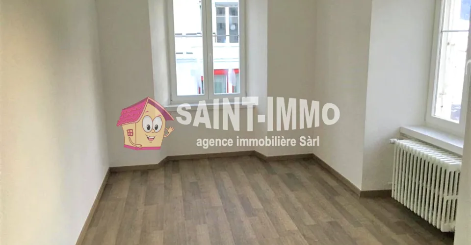 Immeuble locatif mixte de 6 appartements et bar/restaurant en plein centre de Saint-Imier