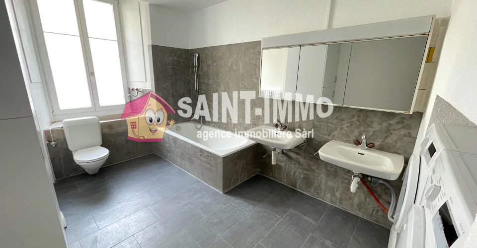 Immeuble locatif mixte de 6 appartements et bar/restaurant en plein centre de Saint-Imier