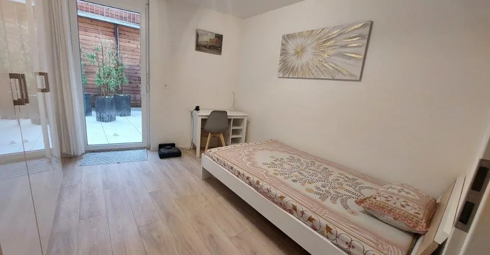 Appartement moderne de 3,5 pièces bénéficiant d'une terrasse et d'un garage