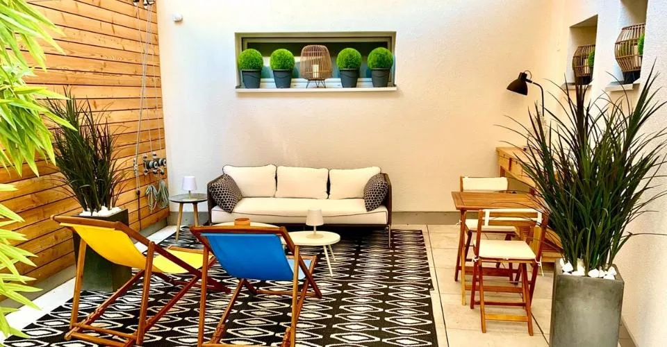 Appartement moderne de 3,5 pièces bénéficiant d'une terrasse et d'un garage