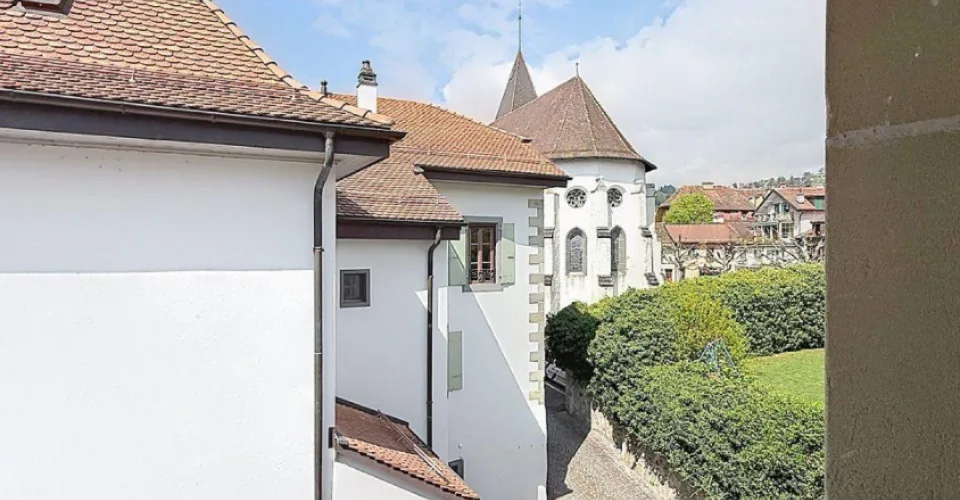 Lutry - Maison atypique dans le bourg