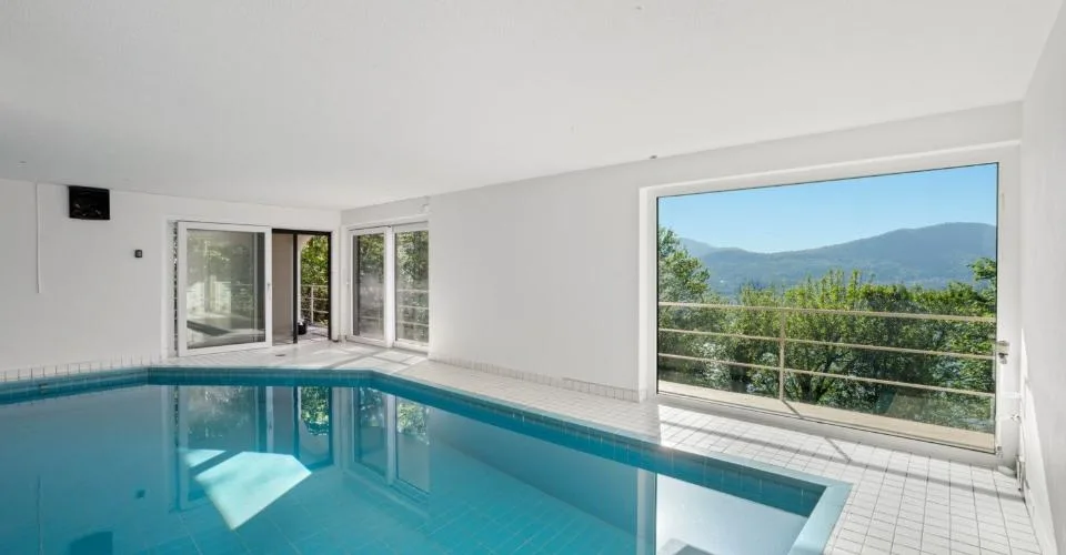 Montagnola - ESCLUSIVO 3,5 LOCALI IN VILLA DI SOLE 4 UNITÀ, UN'OASI DI DESIGN IMMERSA NEL VERDE | Montagnola - EXCLUSIVE 3.5-ROOM APARTMENT IN A VILLA WITH ONLY 4 UNITS, A DESIGN OASIS SURROUNDED BY GREENERY | Montagnola - EXKLUSIVE 3,5-ZIMMER-WOHNUNG IN
