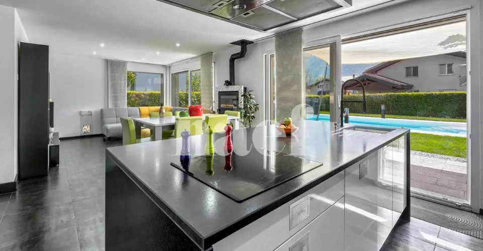 Magnifique maison individuelle de 6.5 pièces avec studio indépendant et piscine extérieure à vendre à Bex