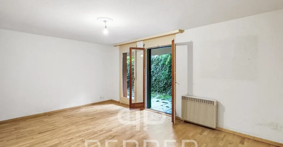 Vaste appartement en rez-de-jardin au coeur de Chailly