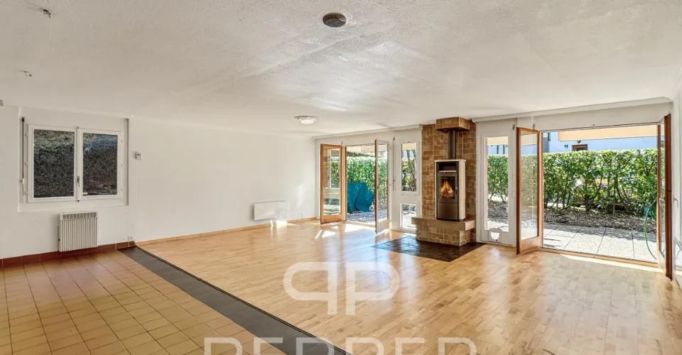 Vaste appartement en rez-de-jardin au coeur de Chailly