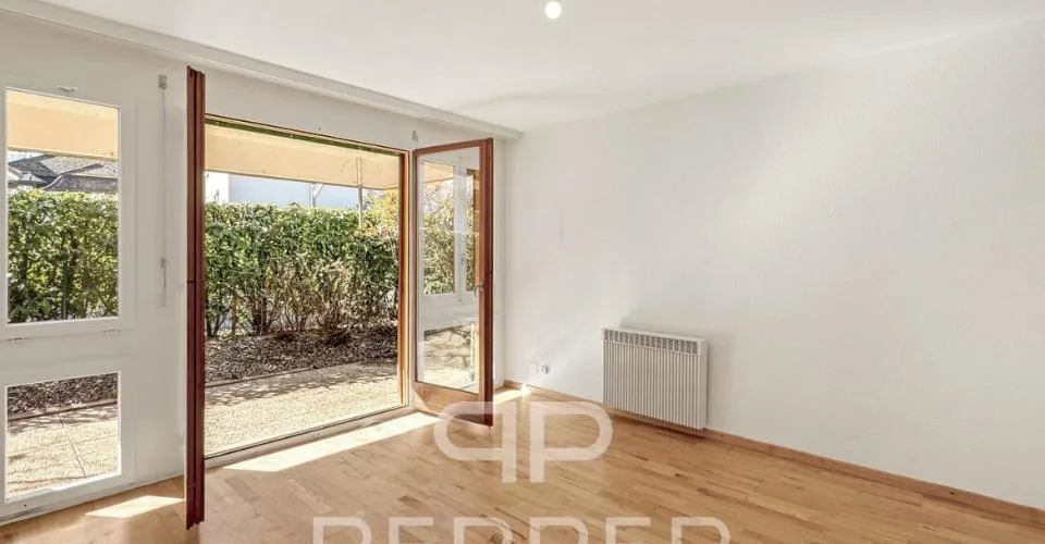 Vaste appartement en rez-de-jardin au coeur de Chailly