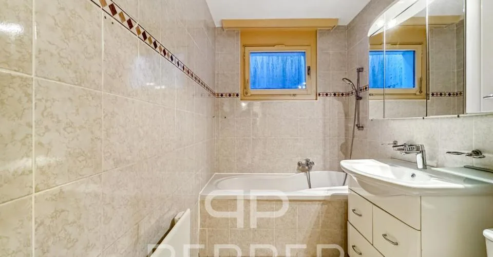 Vaste appartement en rez-de-jardin au coeur de Chailly