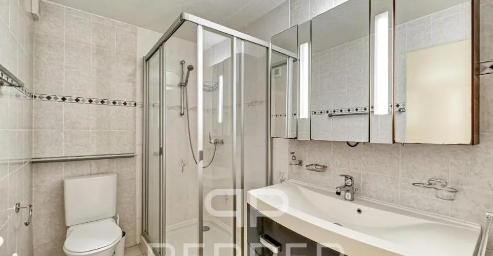 Vaste appartement en rez-de-jardin au coeur de Chailly