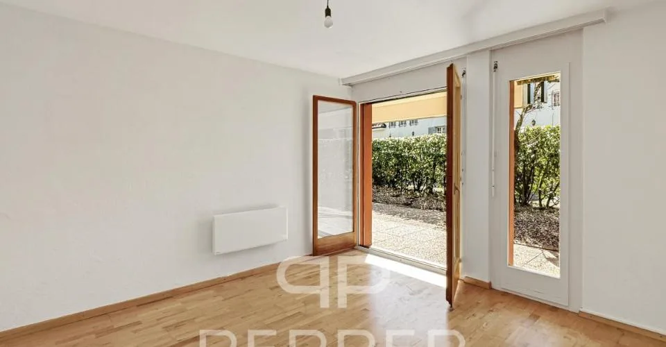 Vaste appartement en rez-de-jardin au coeur de Chailly