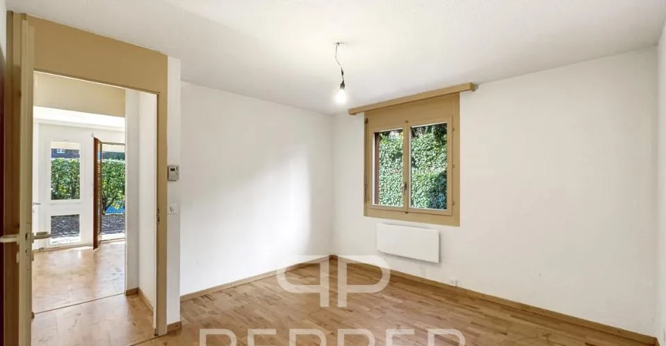 Vaste appartement en rez-de-jardin au coeur de Chailly