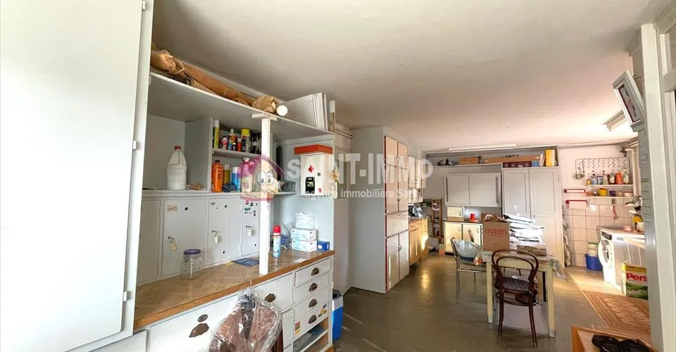 VENDU - Maison de 7 pièces avec jardin, ateliers (+100m2), 3 garages à Sonceboz