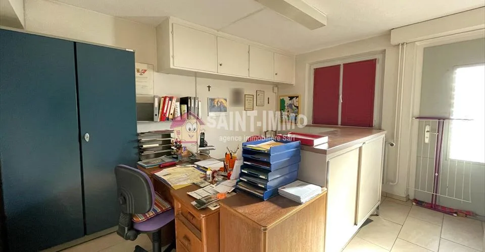 VENDU - Maison de 7 pièces avec jardin, ateliers (+100m2), 3 garages à Sonceboz