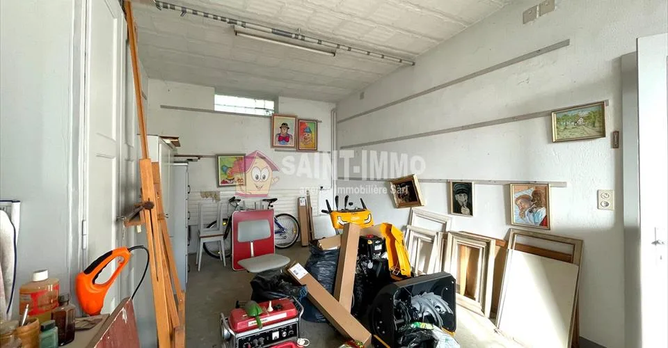 VENDU - Maison de 7 pièces avec jardin, ateliers (+100m2), 3 garages à Sonceboz
