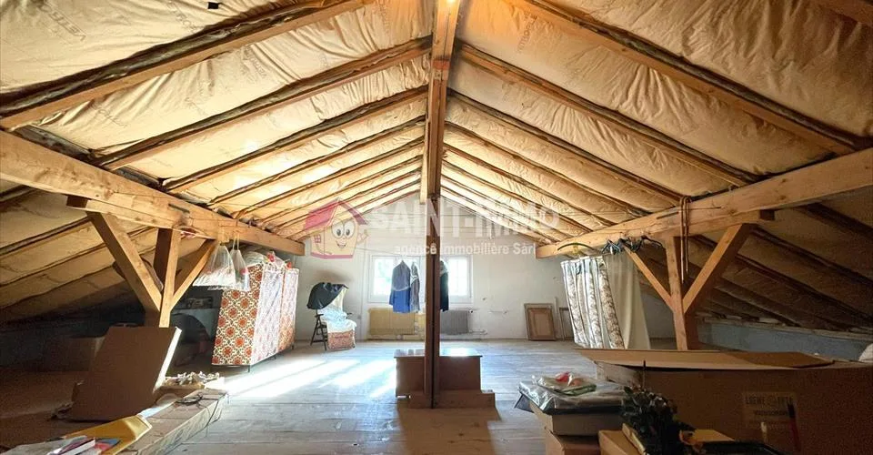 VENDU - Maison de 7 pièces avec jardin, ateliers (+100m2), 3 garages à Sonceboz