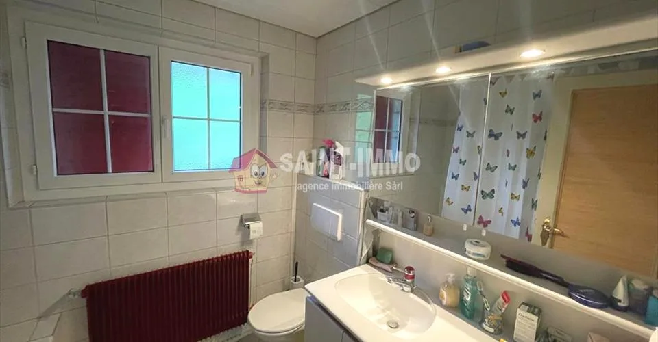 VENDU - Maison de 7 pièces avec jardin, ateliers (+100m2), 3 garages à Sonceboz