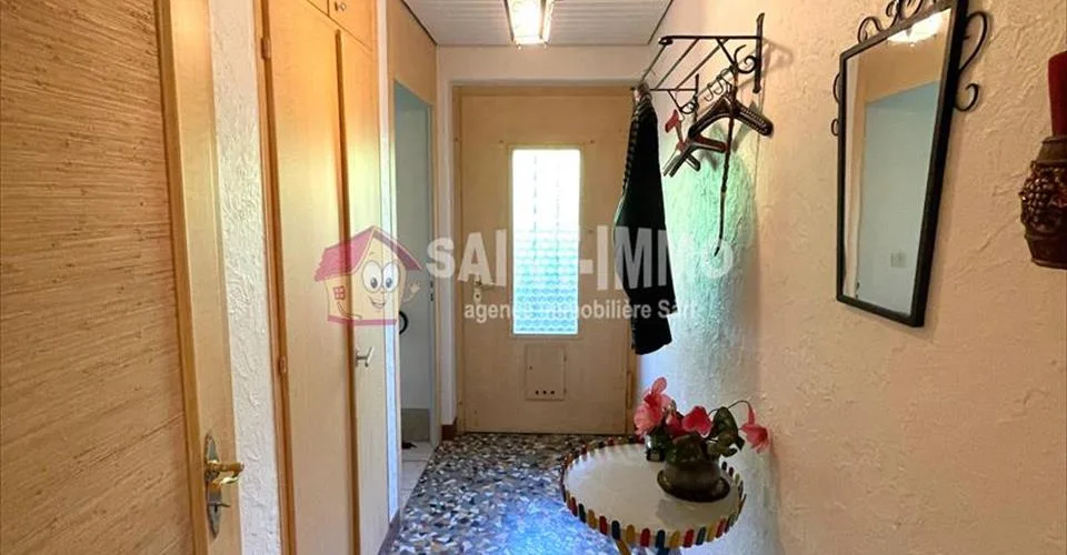 VENDU - Maison de 7 pièces avec jardin, ateliers (+100m2), 3 garages à Sonceboz