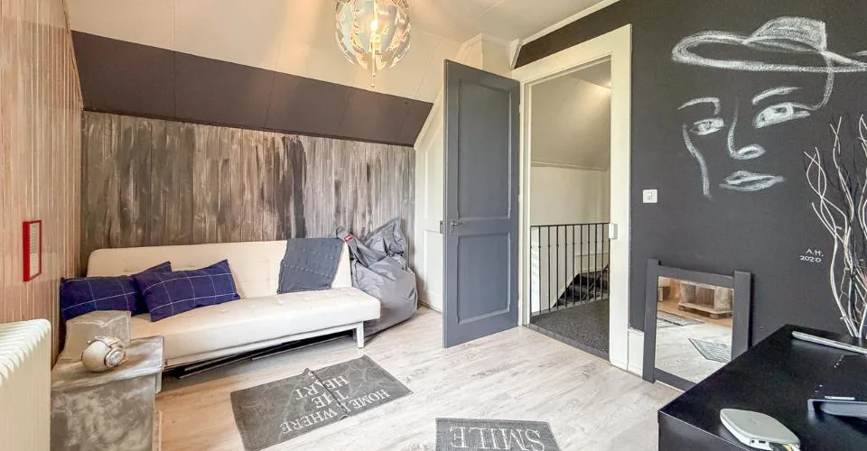 Maison de 2 logements, 1 surface commerciale et 1 garage à Ste-Croix