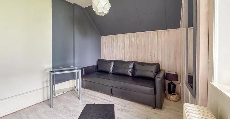 Maison de 2 logements, 1 surface commerciale et 1 garage à Ste-Croix