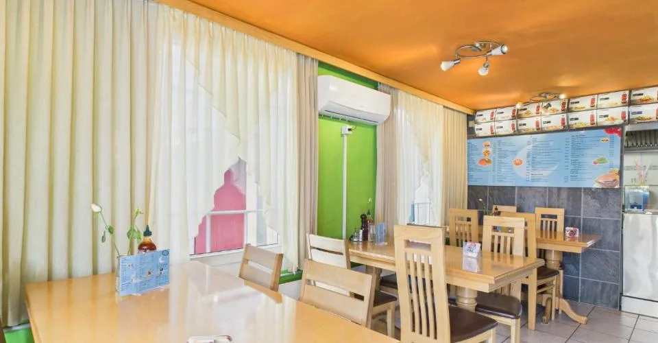 Zweifamilienhaus mit 3.5-Zimmer-Wohnung und Gewerbefläche (Kebab-Laden) im Erdgeschoss