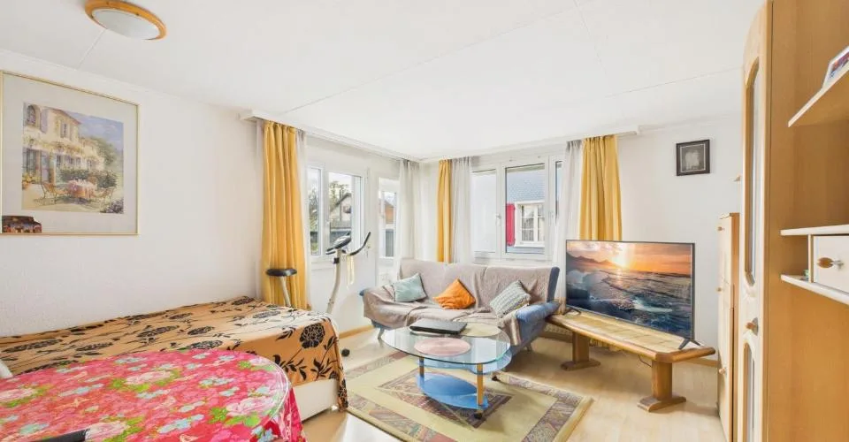 Zweifamilienhaus mit 3.5-Zimmer-Wohnung und Gewerbefläche (Kebab-Laden) im Erdgeschoss