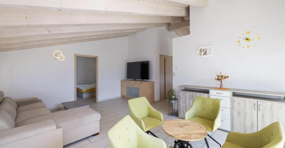 Spacieux attique de 4,5 pièces de 146 m2 bénéficiant d'une vue imprenable sur les Alpes