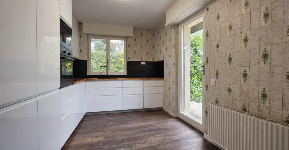 Élégante villa individuelle aux volumes généreux sur parcelle arborée de 1'088 m²