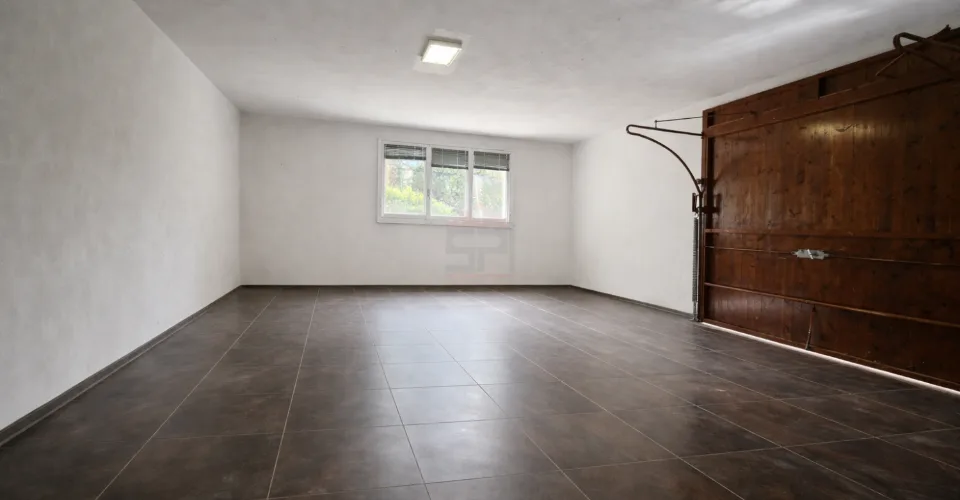 Élégante villa individuelle aux volumes généreux sur parcelle arborée de 1'088 m²