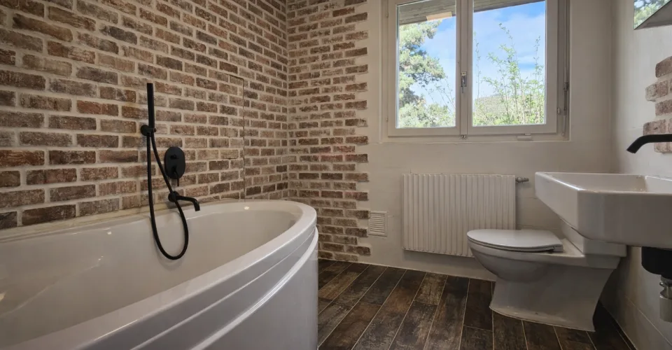 Élégante villa individuelle aux volumes généreux sur parcelle arborée de 1'088 m²