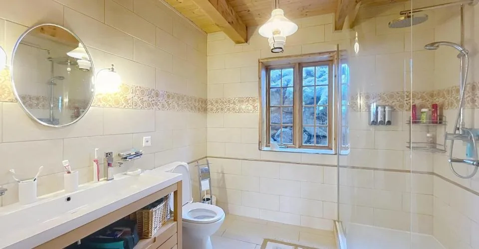 Chalet canadese in tronchi con due appartamenti e vista mozzafiato – foto 10 di 26