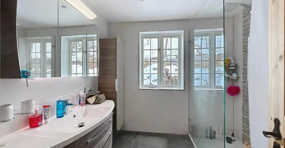 Chalet canadese in tronchi con due appartamenti e vista mozzafiato – foto 9 di 26