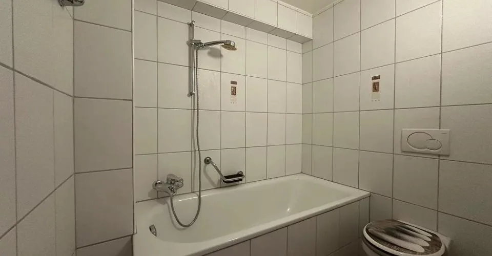 Appartement de 4.5 pièces au 1er étage avec une terrasse – Foto 11 von 12