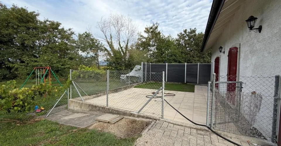 Villa mitoyenne avec jardin située à Yvonand dans quartier tranquille