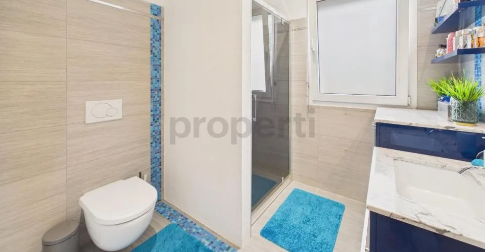 Einfamilienhaus mit 6,5 Zimmern und exklusivem Garten sowie großzügigen Räumen – Foto 10 von 27