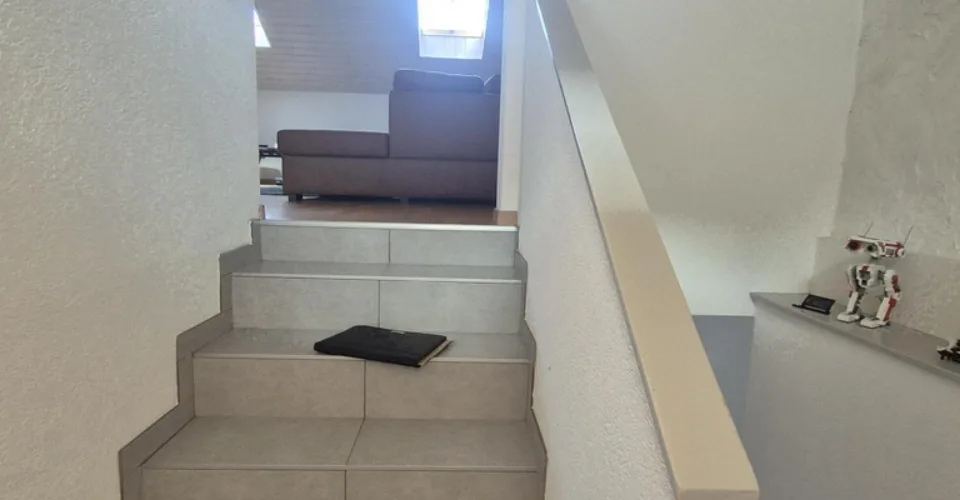 Appartamento di tre e mezzo locali al terzo piano in duplex