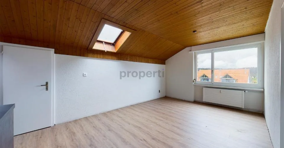Bright rooms, open kitchen, and parking space included