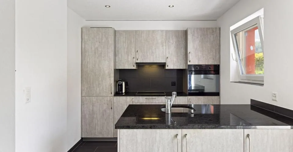 Spacieux 3 pièces 1/2 en rez-de-jardin de 107 m² – photo 24 sur 32