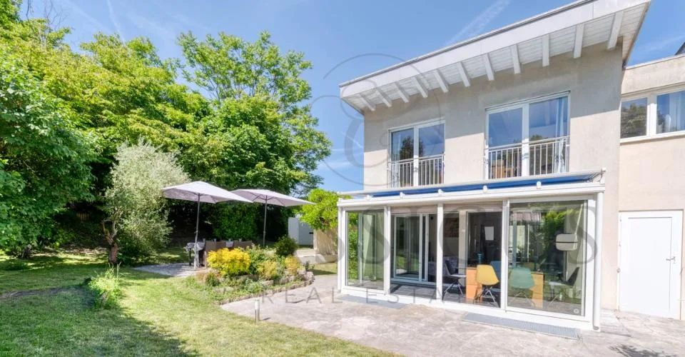 Maison familiale en pignon avec jardin privatif, véranda et 4 stationnements – photo 14 sur 26